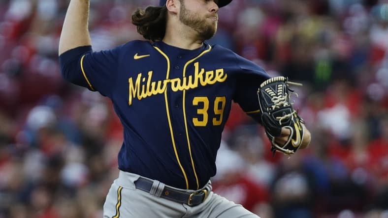 Sep 24, 2022; Cincinnati, Ohio, USA; Milwaukee Brewers starting pitcher Corbin Burnes (39) throws a pitch against the Cincinnati Reds during the first inning at Great American Ball Park. Mandatory Credit: David Kohl-USA TODAY Sports