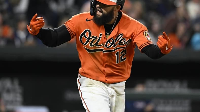Sep 24, 2022; Baltimore, Maryland, USA;  Baltimore Orioles second baseman Rougned Odor (12) reacts after hitting a home run against the Houston Astros during the ninth inning at Oriole Park at Camden Yards. Mandatory Credit: James A. Pittman-USA TODAY Sports