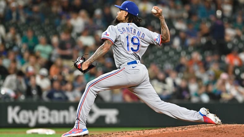 Sep 27, 2022; Seattle, Washington, USA; Texas Rangers relief pitcher Dennis Santana (19) pitches to the Seattle Mariners during the sixth inning at T-Mobile Park. Mandatory Credit: Steven Bisig-USA TODAY Sports
