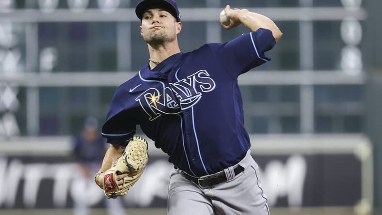 Oct 1, 2022; Houston, Texas, USA; Tampa Bay Rays starting pitcher Shane McClanahan (18) delivers a pitch during the third inning against the Houston Astros at Minute Maid Park. Mandatory Credit: Troy Taormina-USA TODAY Sports