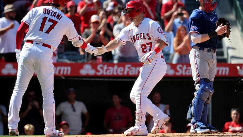 POWERED COUPLE: Angels center fielder Mike Trout (27) and designated hitter Shohei Ohtani (17) after hitting a home run during the fourth inning against the Texas Rangers at Angel Stadium. Mandatory Credit: Kiyoshi Mio-USA TODAY Sports