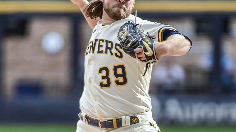 Oct 5, 2022; Milwaukee, Wisconsin, USA; Milwaukee Brewers pitcher Corbin Burnes (39) throws a pitch in the first inning against the Arizona Diamondbacks at American Family Field. Mandatory Credit: Benny Sieu-USA TODAY Sports