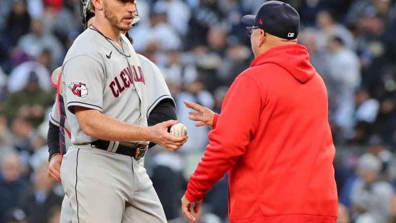 Oct 18, 2022; Bronx, New York, USA; Cleveland Guardians manager Terry Francona (77) takes relief pitcher Trevor Stephan (37) out of the game against the New York Yankees during the fifth inning in game five of the ALDS for the 2022 MLB Playoffs at Yankee Stadium. Mandatory Credit: Wendell Cruz-USA TODAY Sports