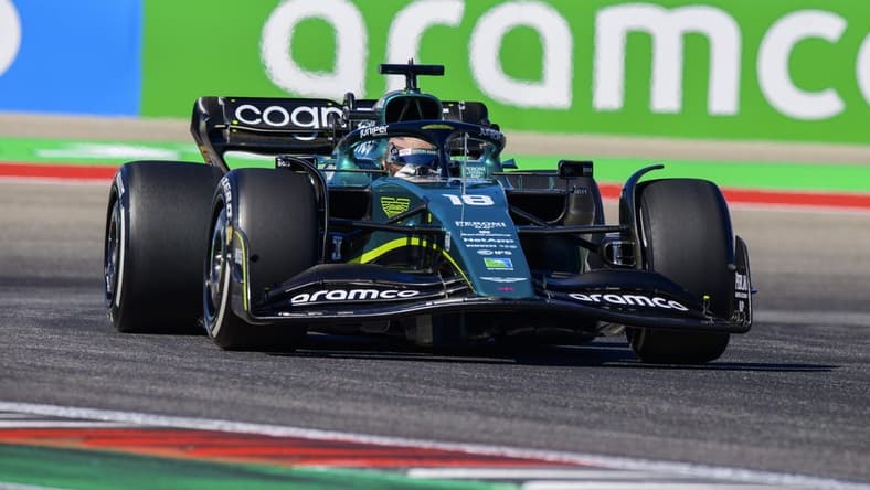 Oct 21, 2022; Austin, Texas, USA; Aston Martin Aramco Cognizant Formula One Team driver Lance Stroll (18) of Team Canada drives during practice for the U.S. Grand Prix at the Circuit of the Americas. Mandatory Credit: Jerome Miron-USA TODAY Sports