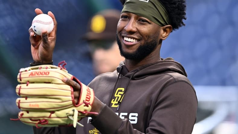 Oct 22, 2022; Philadelphia, Pennsylvania, USA; San Diego Padres left fielder Jurickson Profar (10) warms up before game four of the NLCS against the Philadelphia Phillies for the 2022 MLB Playoffs at Citizens Bank Park. Mandatory Credit: Kyle Ross-USA TODAY Sports