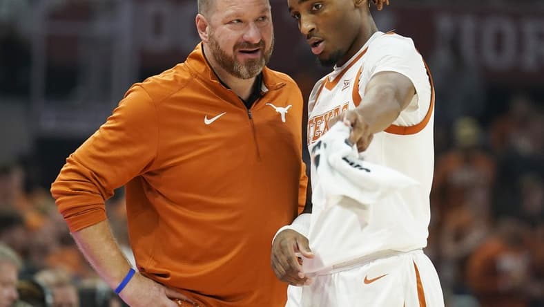 Nov 10, 2022; Austin, Texas, USA; Texas Longhorns head coach Chris Beard talks with guard Arterio Morris (2) during the first half against the Houston Christian Huskies at Moody Center. Mandatory Credit: Scott Wachter-USA TODAY Sports