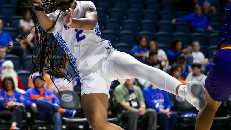 Florida Gators forward Tatyana Wyche (2) tries to make a saving passing while falling out of bounds. The Florida women's basketball team hosted Prairie View A&M in the second half at Exactech Arena at the Stephen C. O  Connell Center in Gainesville, FL on Wednesday, November 30, 2022. Florida won 68-53.[Doug Engle/Ocala Star Banner]

Flgai 120222 Pvam Uf Wbk