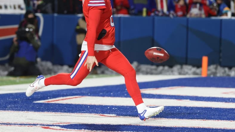 Bills punter Sam Martin kicks out of his own end zone.