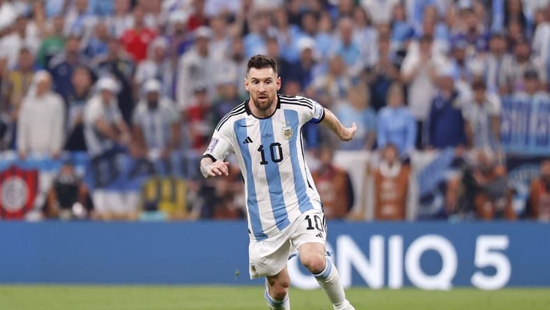 Dec 18, 2022; Lusail, Qatar; Argentina forward Lionel Messi (10) dribbles the ball against France during the first half of the 2022 World Cup final at Lusail Stadium. Mandatory Credit: Yukihito Taguchi-USA TODAY Sports
