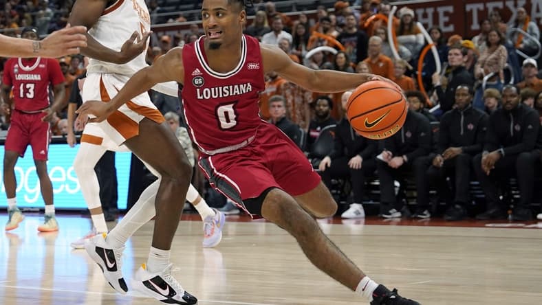 Dec 21, 2022; Austin, Texas, USA; Louisiana-Lafayette Ragin' Cajuns guard Themus Fulks (0) looks to pass the ball during the second half against the Texas Longhorns at Moody Center. Mandatory Credit: Scott Wachter-USA TODAY Sports