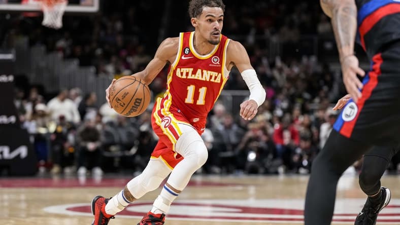 Dec 23, 2022; Atlanta, Georgia, USA; Atlanta Hawks guard Trae Young (11) dribbles the ball against the Detroit Pistons during the second half at State Farm Arena. Mandatory Credit: Dale Zanine-USA TODAY Sports