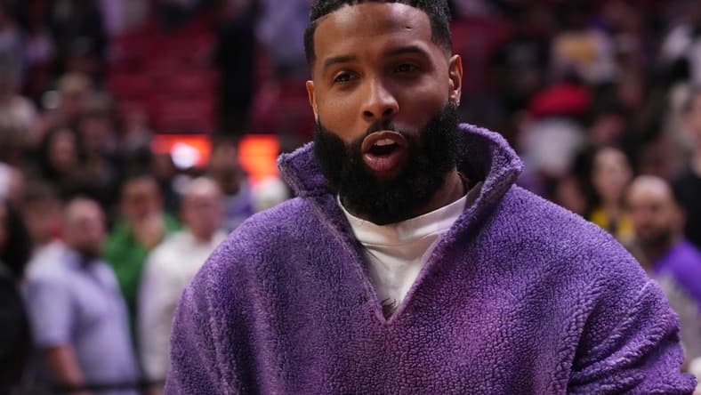 Dec 28, 2022; Miami, Florida, USA; Football player Odell Beckham stands on the court after the game between the Miami Heat and the Los Angeles Lakers at FTX Arena. Mandatory Credit: Jasen Vinlove-USA TODAY Sports