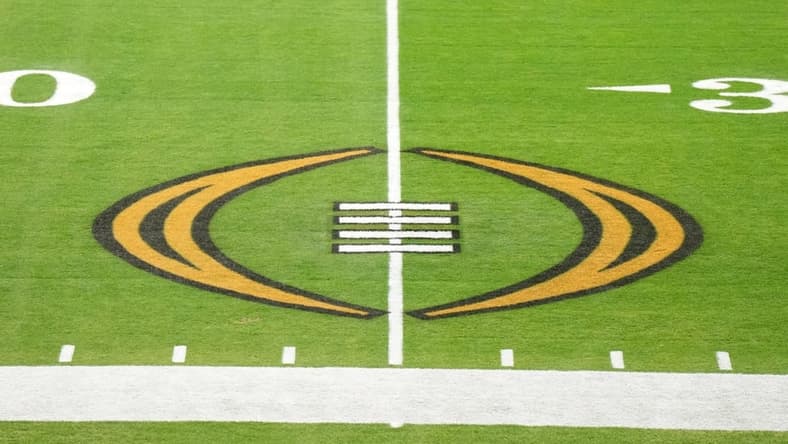 Dec 30, 2022; Glendale AZ, USA; The College Football Playoff logo on the field at State Farm Stadium, the site of the 2022 CFP Semifinal between the TCU Horned Frogs and the Michigan Wolverines and Super Bowl 57 (LVII). Mandatory Credit: Kirby Lee-USA TODAY Sports