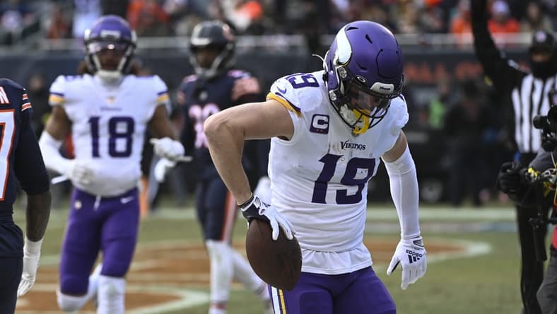 Jan 8, 2023; Chicago, Illinois, USA;  Minnesota Vikings wide receiver Adam Thielen (19) celebrates his touchdown against the Chicago Bears during the first half at Soldier Field. Mandatory Credit: Matt Marton-USA TODAY Sports