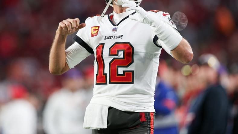 Jan 16, 2023; Tampa, Florida, USA; Tampa Bay Buccaneers quarterback Tom Brady (12) takes the field before a wild card game against the Dallas Cowboys at Raymond James Stadium. Mandatory Credit: Nathan Ray Seebeck-USA TODAY Sports