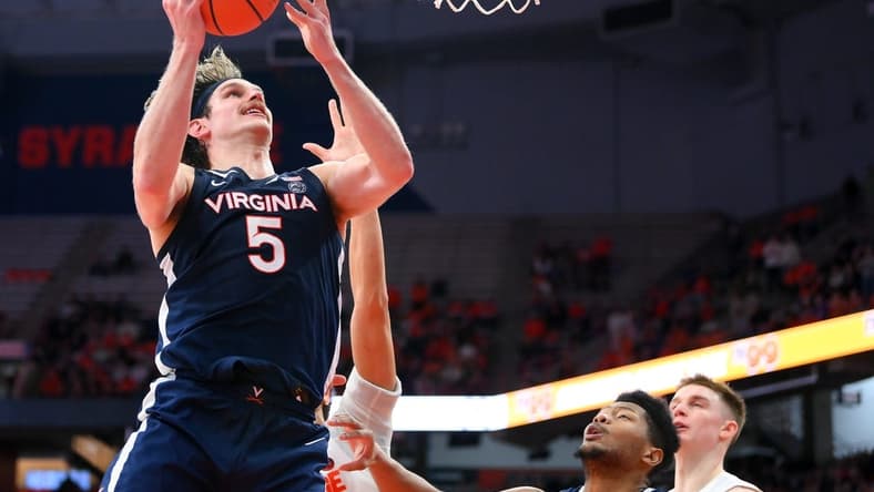 Jan 30, 2023; Syracuse, New York, USA; Virginia Cavaliers forward Ben Vander Plas (5) drives for a shot against the Syracuse Orange during the second half at the JMA Wireless Dome. Mandatory Credit: Rich Barnes-USA TODAY Sports