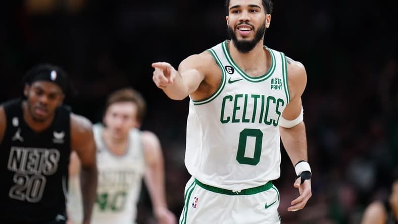 Feb 1, 2023; Boston, Massachusetts, USA; Boston Celtics forward Jayson Tatum (0) reacts after his three point basket against the Brooklyn Nets in the second half at TD Garden. Mandatory Credit: David Butler II-USA TODAY Sports