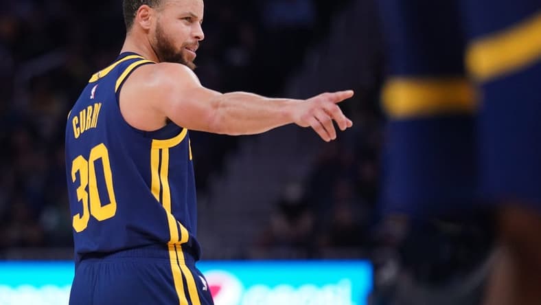 Feb 4, 2023; San Francisco, California, USA; Golden State Warriors guard Stephen Curry (30) directs teammates before a play against the Dallas Mavericks in the third quarter at the Chase Center. Mandatory Credit: Cary Edmondson-USA TODAY Sports