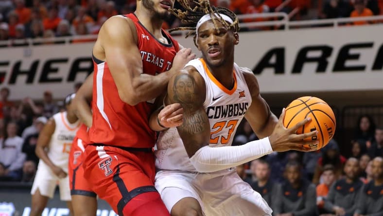 Oklahoma State Cowboys forward Tyreek Smith (23) tries to get past Texas Tech Red Raiders forward Kevin Obanor (0) during a men's college basketball game between the Oklahoma State University Cowboys (OSU) and the Texas Tech Red Raiders at Gallagher-Iba Arena in Stillwater, Okla., Wednesday, Feb. 8, 2023. Oklahoma State won 71-68.

Osu Vs Texas Tech Men S Basketball