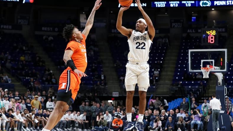 Feb 14, 2023; University Park, Pennsylvania, USA; Penn State Nittany Lions guard Jalen Pickett (22) shoots the ball as Illinois Fighting Illini guard Terrence Shannon Jr (0) defends during the first half at Bryce Jordan Center. Penn State defeated Illinois 93-81. Mandatory Credit: Matthew OHaren-USA TODAY Sports