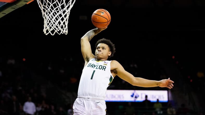 Feb 13, 2023; Waco, Texas, USA; Baylor Bears guard Keyonte George (1) against the West Virginia Mountaineers during the second half at Ferrell Center. Mandatory Credit: Raymond Carlin III-USA TODAY Sports