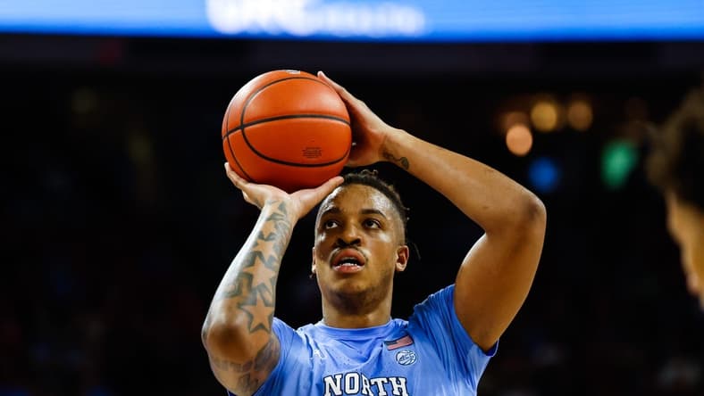 Feb 19, 2023; Raleigh, North Carolina, USA; North Carolina Tar Heels forward Armando Bacot (5) shoots a free throw during the second half of the game against North Carolina State Wolfpack at PNC Arena. Mandatory Credit: Jaylynn Nash-USA TODAY Sports