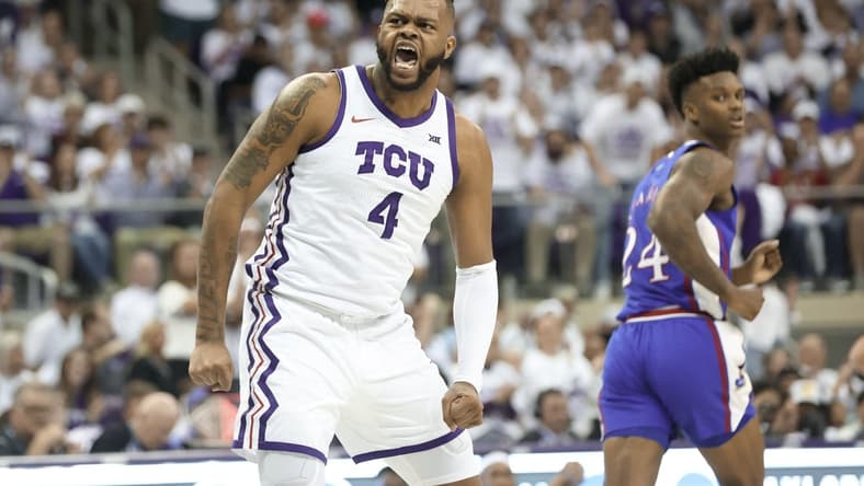 Feb 20, 2023; Fort Worth, Texas, USA; TCU Horned Frogs center Eddie Lampkin Jr. (4) reacts after scoring during the first half Kansas Jayhawks at Ed and Rae Schollmaier Arena. Mandatory Credit: Kevin Jairaj-USA TODAY Sports