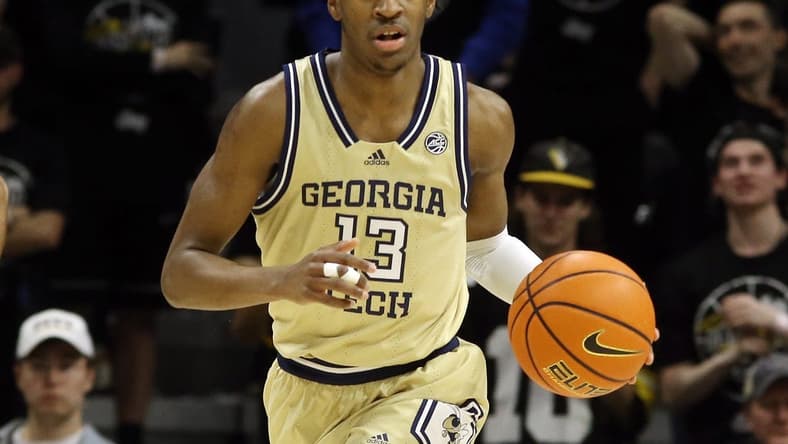 Feb 21, 2023; Pittsburgh, Pennsylvania, USA;  Georgia Tech Yellow Jackets guard Miles Kelly (13) brings the ball up court against the Pittsburgh Panthers during the first half at the Petersen Events Center. Mandatory Credit: Charles LeClaire-USA TODAY Sports