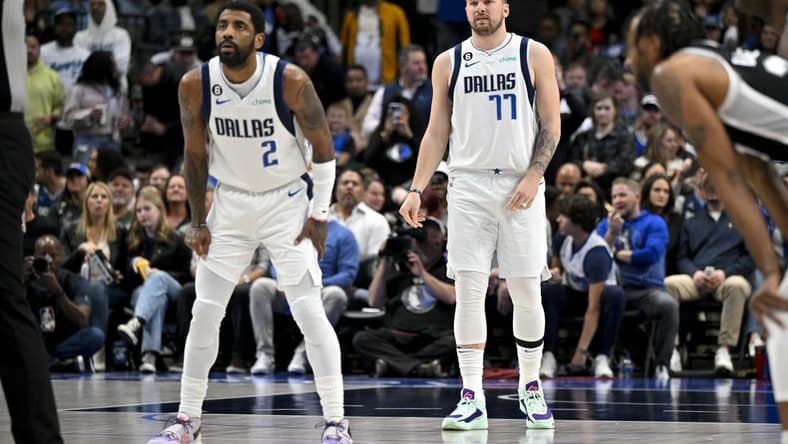 Feb 23, 2023; Dallas, Texas, USA; Dallas Mavericks guard Kyrie Irving (2) and guard Luka Doncic (77) prepare to face the San Antonio Spurs at the American Airlines Center. Mandatory Credit: Jerome Miron-USA TODAY Sports