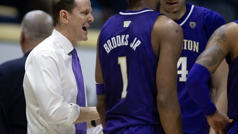 Feb 23, 2023; Berkeley, California, USA; Washington Huskies head coach Mike Hopkins confers with his team during a time out in the second half against the California Golden Bears at Haas Pavilion. Mandatory Credit: D. Ross Cameron-USA TODAY Sports