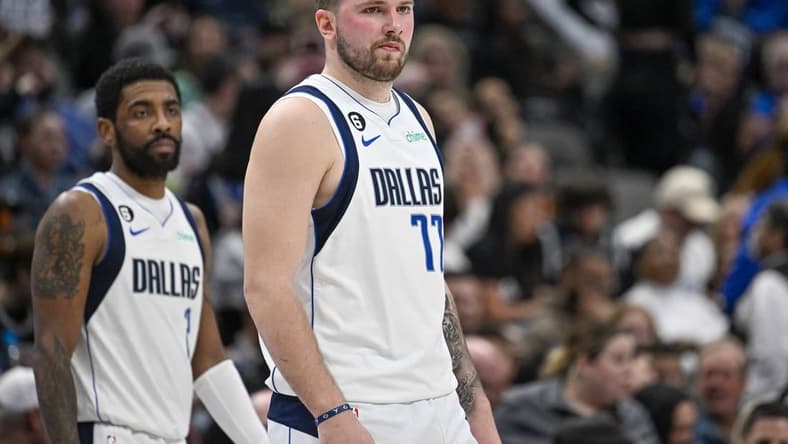 Feb 23, 2023; Dallas, Texas, USA; Dallas Mavericks guard Kyrie Irving (2) and guard Luka Doncic (77) during the game between the Dallas Mavericks and the San Antonio Spurs at American Airlines Center. Mandatory Credit: Jerome Miron-USA TODAY Sports