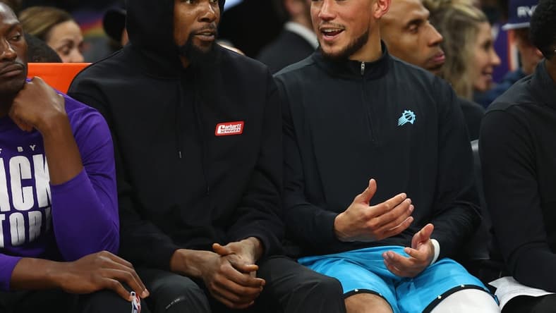 Feb 24, 2023; Phoenix, Arizona, USA; Phoenix Suns forward Kevin Durant (left) and guard Devin Booker against the Oklahoma City Thunder in the second half at Footprint Center. Mandatory Credit: Mark J. Rebilas-USA TODAY Sports