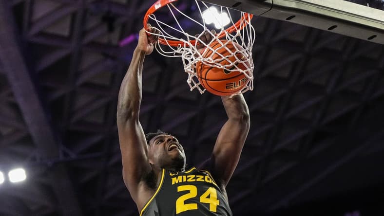 Feb 25, 2023; Athens, Georgia, USA; Missouri Tigers guard Kobe Brown (24) dunks against the Georgia Bulldogs during the first half at Stegeman Coliseum. Mandatory Credit: Dale Zanine-USA TODAY Sports