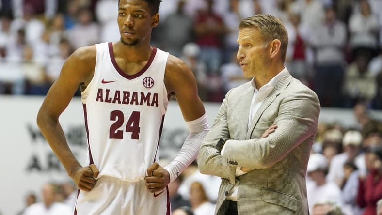 Feb 25, 2023; Tuscaloosa, Alabama, USA; Alabama Crimson Tide forward Brandon Miller (24) talks to head coach Nate Oats during the second half against the Arkansas Razorbacks at Coleman Coliseum. Mandatory Credit: Marvin Gentry-USA TODAY Sports
