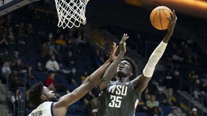 February 25, 2023; Berkeley, California, USA; Washington State Cougars forward Mouhamed Gueye (35) shoots the basketball against California Golden Bears forward ND Okafor (22) during the first half at Haas Pavilion. Mandatory Credit: Kyle Terada-USA TODAY Sports