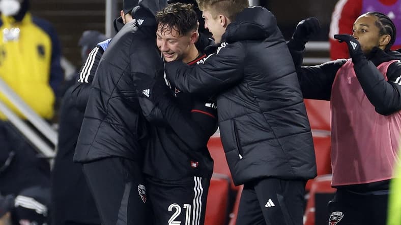 Feb 25, 2023; Washington, District of Columbia, USA; D.C. United forward Theodore Ku-Dipietro (21) reacts after scoring a goal against Toronto FC during the second half at Audi Field. Mandatory Credit: Geoff Burke-USA TODAY Sports