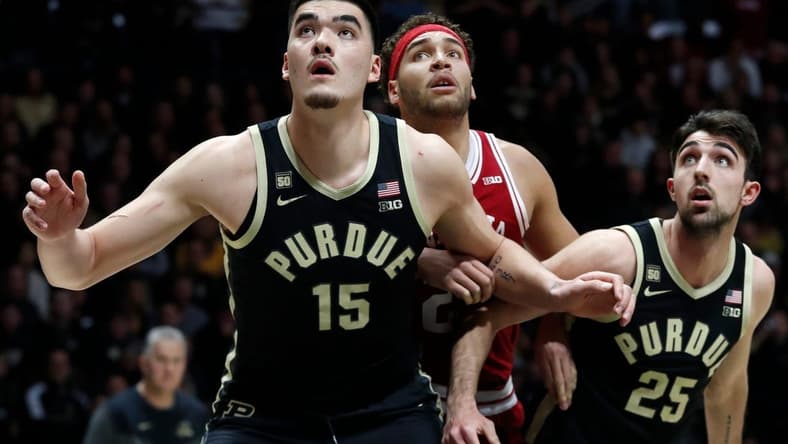 Purdue Boilermakers center Zach Edey (15) and Purdue Boilermakers guard Ethan Morton (25) box out Indiana Hoosiers forward Race Thompson (25) during the NCAA men s basketball game, Saturday, Feb. 25, 2023, at Mackey Arena in West Lafayette, Ind. Indiana Hoosiers won 79-71.
Purdueiumbb022523 Am554