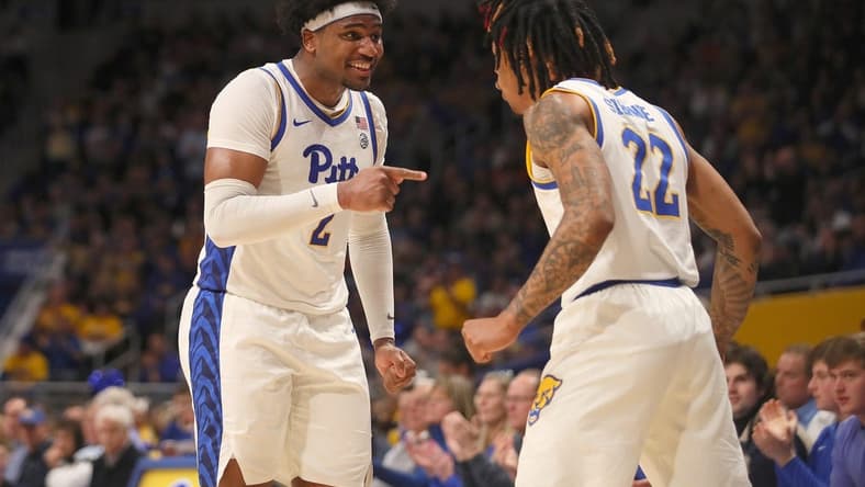 Pittsburgh Panthers Nike Sibande (22) celebrates with Blake Hinson (2) after making a three point shot during the second half against the Syracuse Orange on February 25, 2023 at the Petersen Events Center in Pittsburgh, PA.
Pittsburgh Panthers Vs Syracuse Orange Mens Basketball