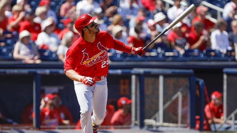 Feb 28, 2023; West Palm Beach, Florida, USA; St. Louis Cardinals third baseman Nolan Arenado (28) hits a home run during the first inning against the Washington Nationals at The Ballpark of the Palm Beaches. Mandatory Credit: Sam Navarro-USA TODAY Sports