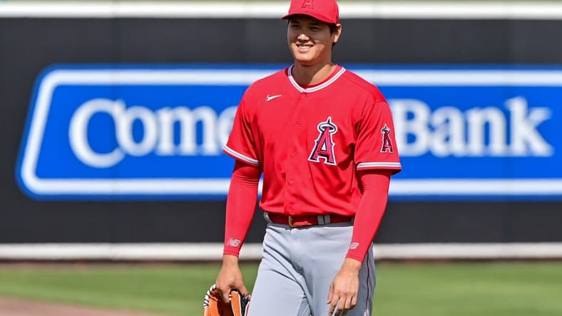 Feb 28, 2023; Mesa, Arizona, USA; Los Angeles Angels starting pitcher Shohei Ohtani (17) looks on prior to the game against the Oakland Athletics during a Spring Training game at Hohokam Stadium. Mandatory Credit: Matt Kartozian-USA TODAY Sports