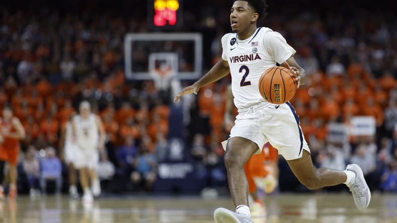 Feb 28, 2023; Charlottesville, Virginia, USA; Virginia Cavaliers guard Reece Beekman (2) drives to the basket against the Clemson Tigers in the second half at John Paul Jones Arena. Mandatory Credit: Geoff Burke-USA TODAY Sports