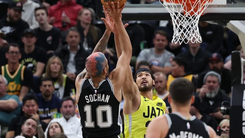 Feb 28, 2023; Salt Lake City, Utah, USA; San Antonio Spurs forward Jeremy Sochan (10) shoots over Utah Jazz guard Johnny Juzang (33) in the second half at Vivint Arena. Mandatory Credit: Rob Gray-USA TODAY Sports