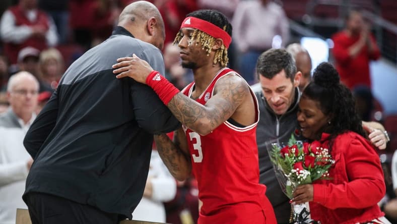 Louisville senior guard El Ellis greets head coach Kenny Payne as his mother gets a hug from athletic director Josh Heird during a pre-game ceremony. The Hokies defeated the Cards 71-54 Tuesday night at the KFC Yum Center. The Cards finished 4-26 overall, 2-17 in the ACC. Feb. 28, 2023
Louisville Vs Virginia Tech Final Home Game 2023