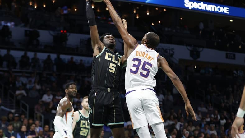 Mar 1, 2023; Charlotte, North Carolina, USA; Charlotte Hornets center Mark Williams (5) has his shot blocked by Phoenix Suns forward Kevin Durant (35) during first half action at Spectrum Center. Mandatory Credit: Brian Westerholt-USA TODAY Sports