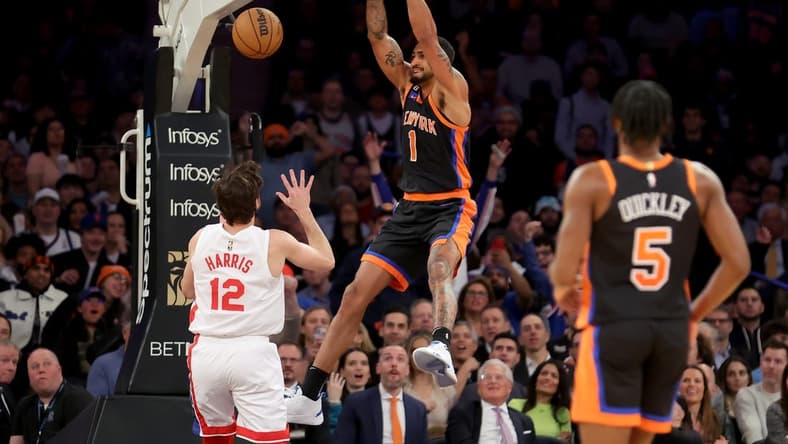 Mar 1, 2023; New York, New York, USA; New York Knicks forward Obi Toppin (1) dunks against Brooklyn Nets forward Joe Harris (12) during the second quarter at Madison Square Garden. Mandatory Credit: Brad Penner-USA TODAY Sports