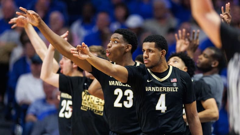 Mar 1, 2023; Lexington, Kentucky, USA; Vanderbilt Commodores guard Jordan Wright (4) celebrates from the bench during the second half against the Kentucky Wildcats at Rupp Arena at Central Bank Center. Mandatory Credit: Jordan Prather-USA TODAY Sports