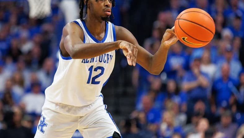 Mar 1, 2023; Lexington, Kentucky, USA; Kentucky Wildcats guard Antonio Reeves (12) passes the ball during the second half against the Vanderbilt Commodores at Rupp Arena at Central Bank Center. Mandatory Credit: Jordan Prather-USA TODAY Sports
