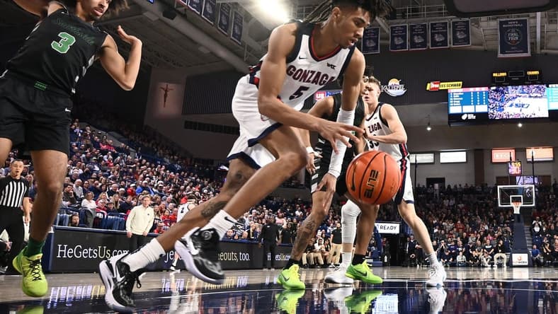 Mar 1, 2023; Spokane, Washington, USA; Gonzaga Bulldogs guard Hunter Sallis (5) rebounds the ball against the Chicago State Cougars in the first half at McCarthey Athletic Center. Mandatory Credit: James Snook-USA TODAY Sports