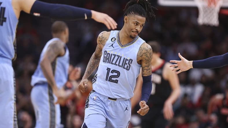 Mar 1, 2023; Houston, Texas, USA; Memphis Grizzlies guard Ja Morant (12) reacts after scoring a basket during the third quarter against the Houston Rockets at Toyota Center. Mandatory Credit: Troy Taormina-USA TODAY Sports