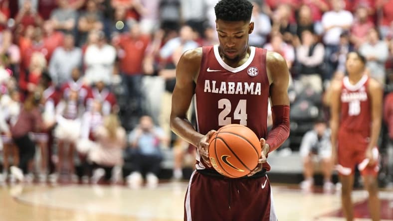 Mar 1, 2023; Tuscaloosa, AL, USA; Alabama forward Brandon Miller (24) comes to the free throw game in overtime at Coleman Coliseum. Alabama defeated Auburn 90-85 in overtime to claim the regular season SEC Championship.

Ncaa Basketball Auburn Tigers At Alabama Crimson Tide